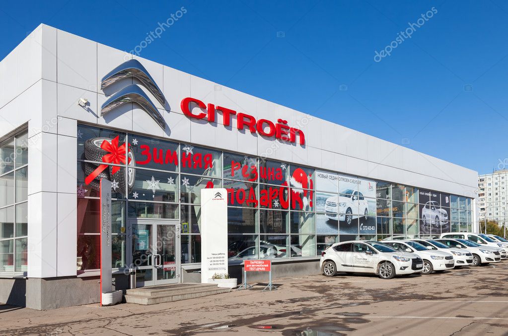 SAMARA, RUSSIA - OCTOBER 20: Building of official dealer Citroen on blue sky background, October 20, 2013 in Samara, Russia. Citroen is a major French automobile manufacturer, part of the PSA Peugeot Citroen group