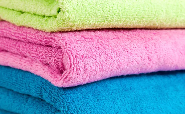 Stack of the multicolored towels — Stock Photo, Image