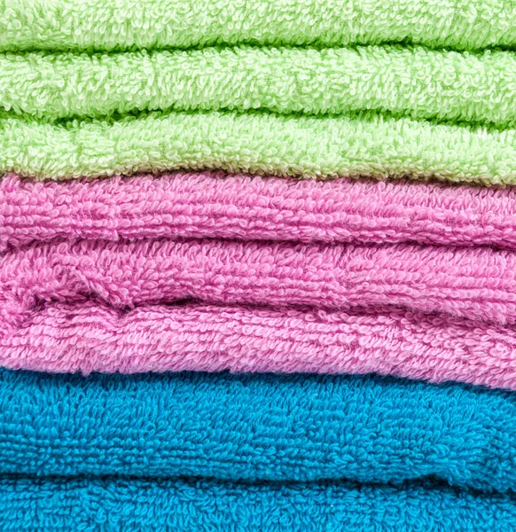 Stack of the multicolored towels — Stock Photo, Image