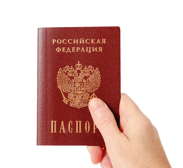 Pasaporte ruso en la mano aislado sobre fondo blanco — Foto de Stock