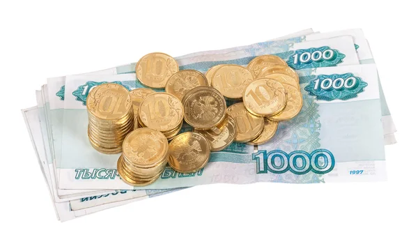 Банкноты и монеты российских рублей — стоковое фото
