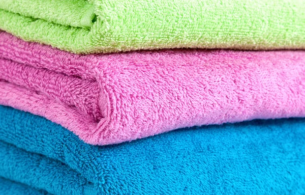 Pila de toallas multicolores —  Fotos de Stock