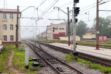 BOLOGOE, RUSSIA - JUNE 30, 2013: View of Rail Terminal in mornin clipart