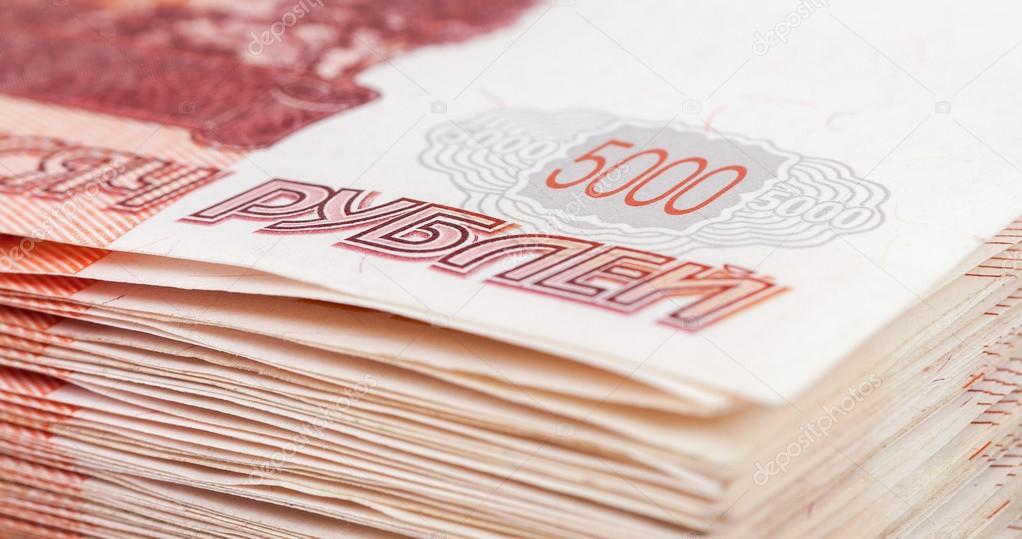 Pile of five thousands russian rubles bills closeup