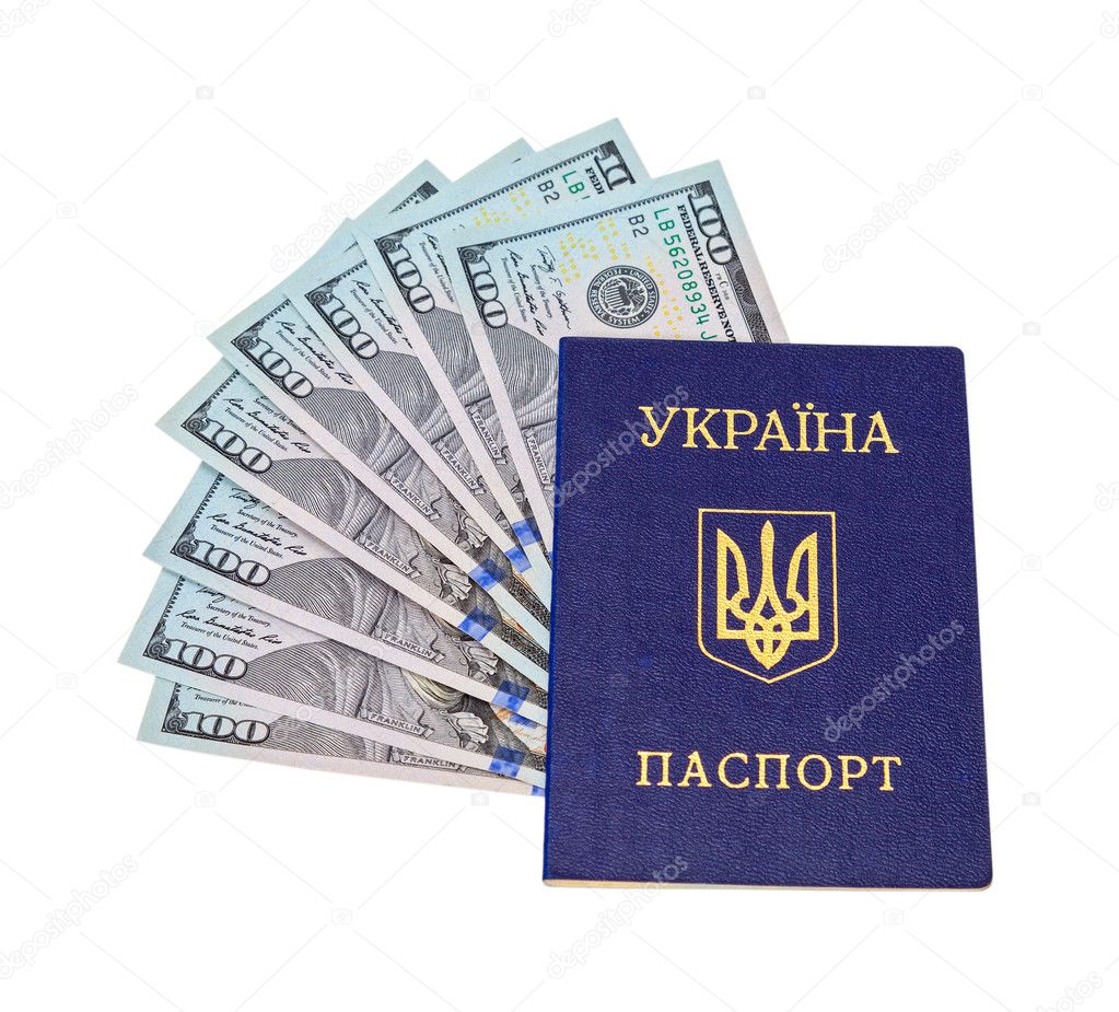 Ukrainian passport and  dollar bills over white background