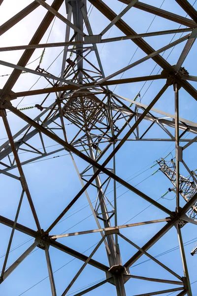 Upward view of the structure under power transmission tower — Stock Photo, Image