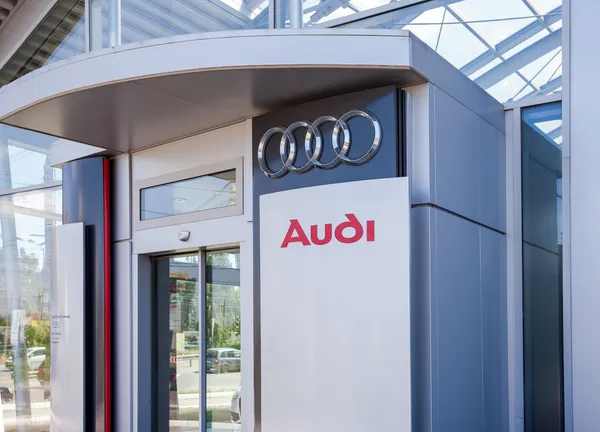 The emblem Audi on the office of official dealer — Stock Photo, Image