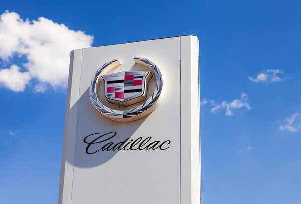 SAMARA, RUSSIA - MAY 24, 2014: The emblem Cadillac over blue sky