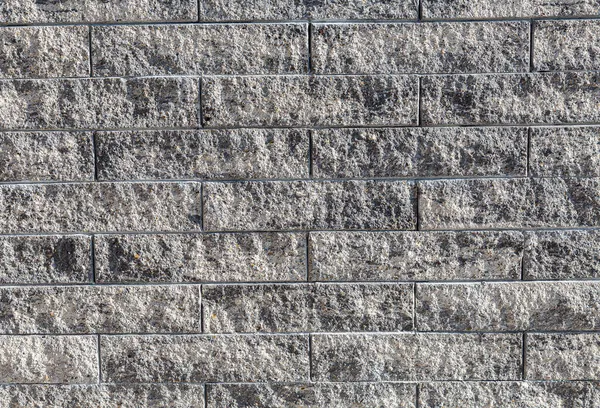 創造的な背景の質感として固体石の壁 — ストック写真