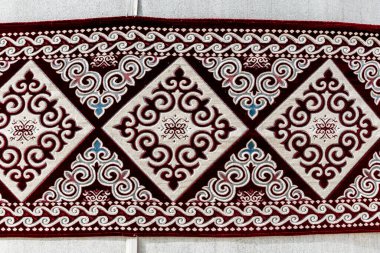 Geleneksel Kazak halı süsü. Göçebelerin dekoratif sanatı. Arkaplan, doku, Türk süslemeleri tasarımı.