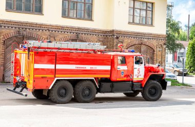 Borovichi, Russia - August 19, 2021: Red fire truck parked up on the city street