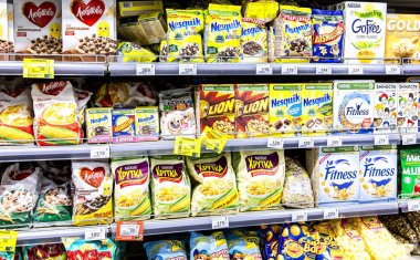 Samara, Russia - October 16, 2021: Various dry breakfasts and muesli in assortment on the store shelf 