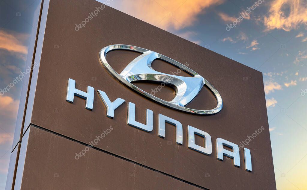 Samara, Russia - May 19, 2018: Hyundai dealership sign against the blue sky. Hyundai Motor Company is a South Korean multinational automotive manufacturer