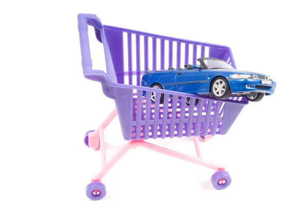 Conceptual photo with car and shopping-cart — Stock Photo, Image