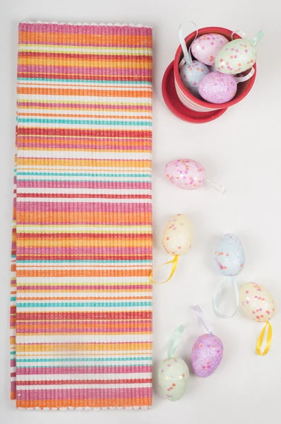 Striped napkin and easter eggs — Stock Photo, Image