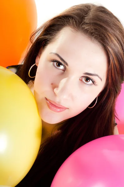 Beautiful woman with multicolored air balloons — Stock Photo, Image