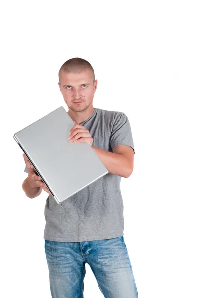 Hombre sosteniendo un portátil en sus manos — Foto de Stock