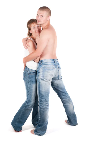 Casal em estúdio levando para o peito — Fotografia de Stock