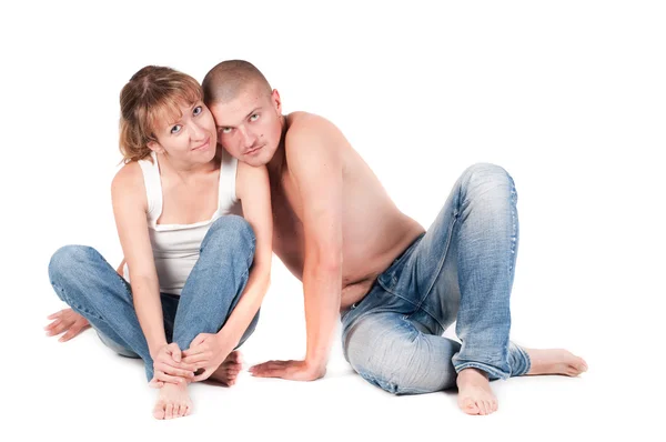 Couple in studio sitting — Stock Photo, Image