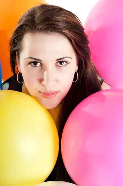 Beautiful female with multicolored air balloons — Stock Photo, Image