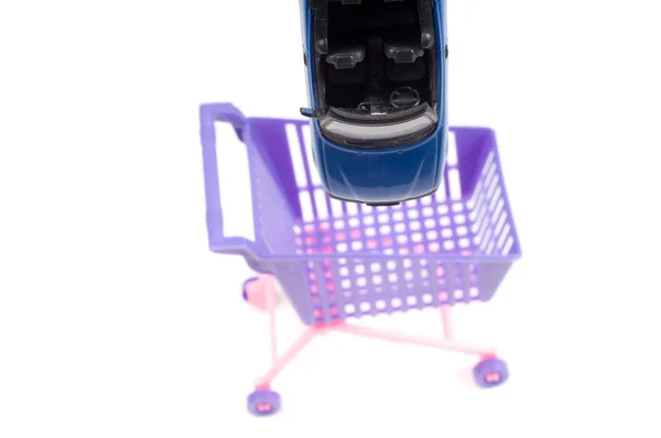 Car falling into shopping-cart — Stock Photo, Image