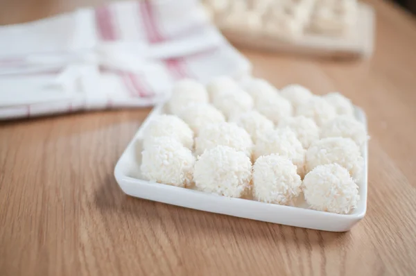 Coco balls in plate on the table — Stock Photo, Image
