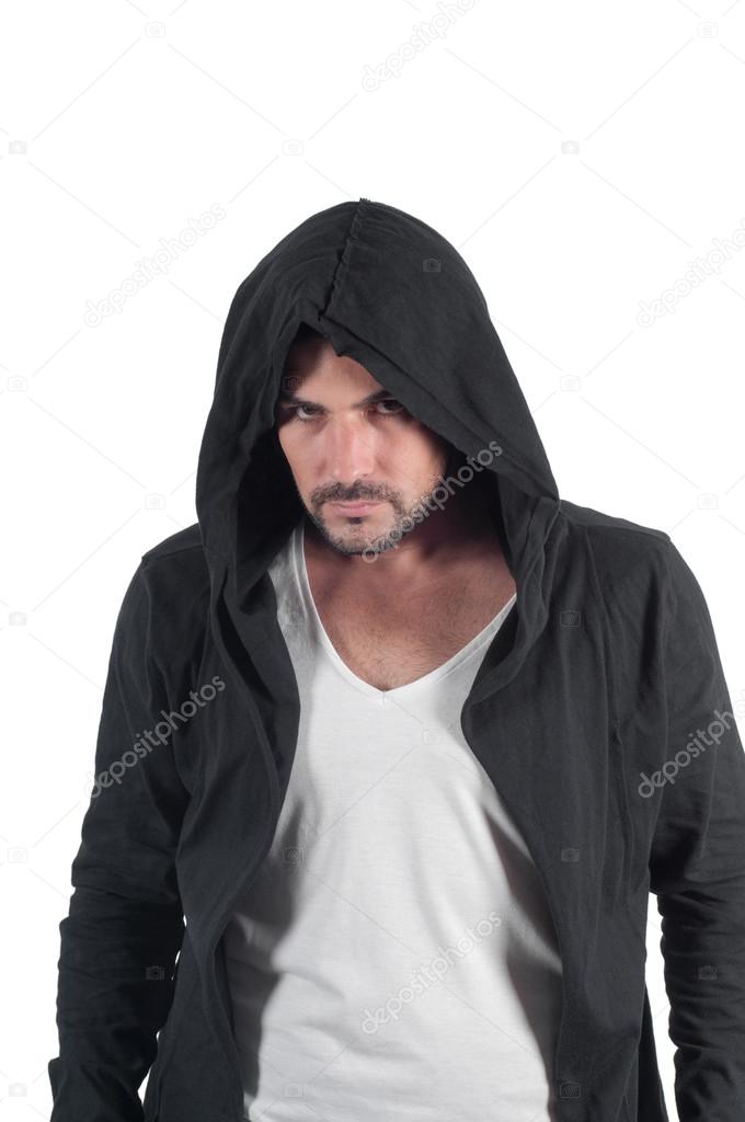 Portrait of a young angry male in the hood