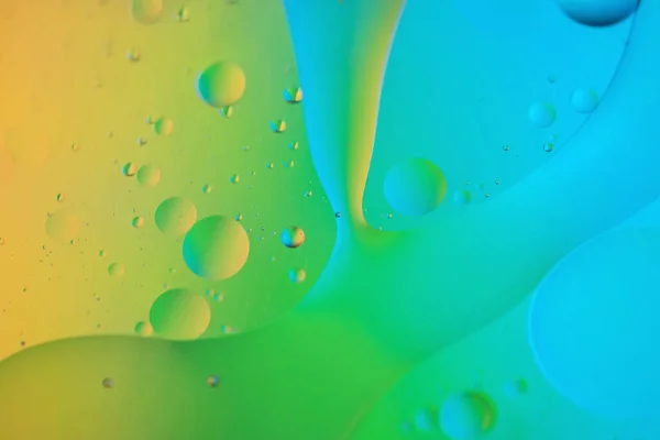 Colorful abstract background with oil drops on water — Stock Photo, Image