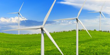 Green meadow with wind power generators clipart