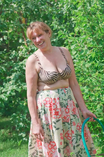 Woman with flowers — Stock Photo, Image