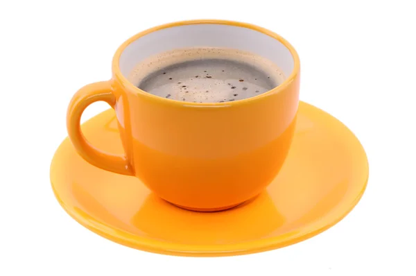 Orange Tasse und Untertasse — Stockfoto