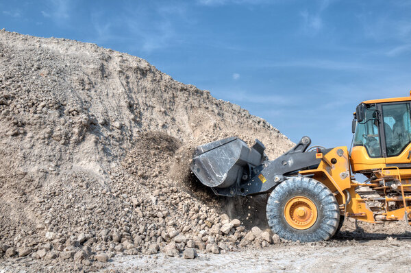 Excavator loader with backhoe works