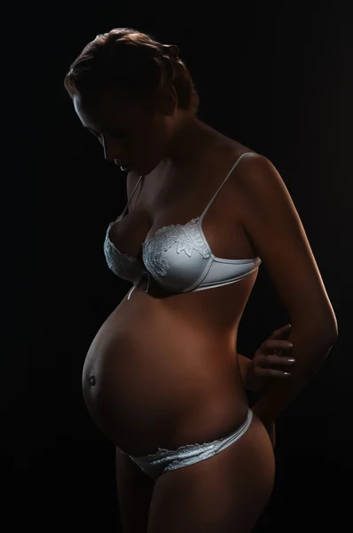 Silhouette of the pregnant woman — Stock Photo, Image