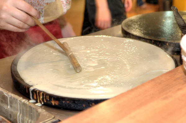 Baking pancakes - traditional Russian cuisine — Stock Photo, Image