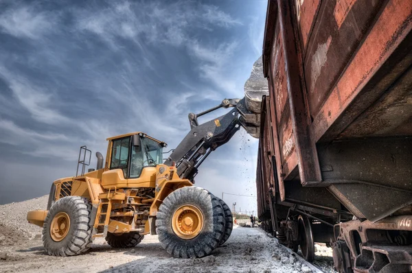 Excavator loader with backhoe works Royalty Free Stock Images