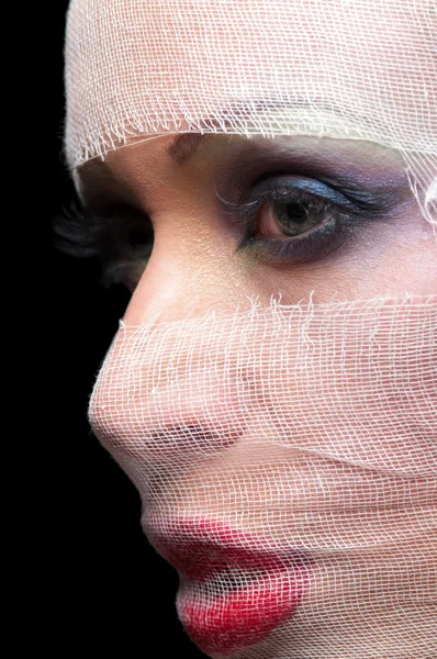 Portrait of a woman in a bandage — Stock Photo, Image