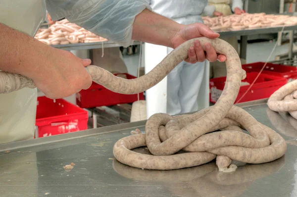 Primer plano haciendo salchichas proceso automático — Foto de Stock