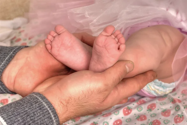 Dolci piedi del bambino — Foto Stock