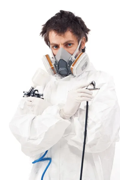 Worker with airbrush gun — Stock Photo, Image