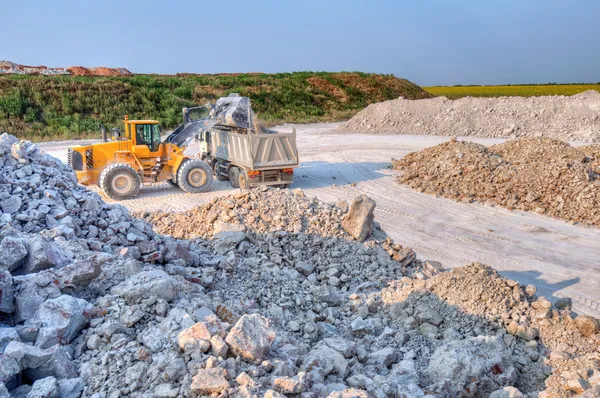 Loading a large lorry building material — Stock Image Loading a large lorry building material Stock Photo