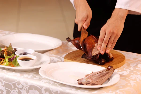 Cooking roast duck in restaurant — Stock Photo, Image