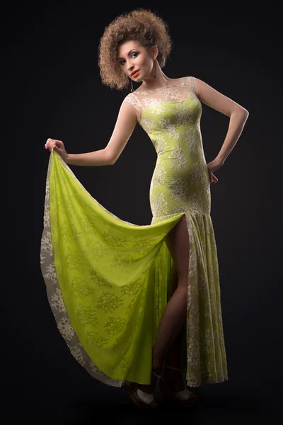 Woman in green dress — Stock Photo, Image