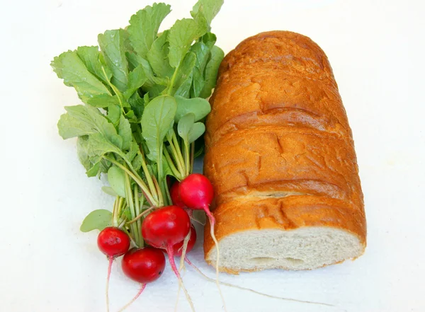 Vegetables radish and bread — Stock Photo, Image