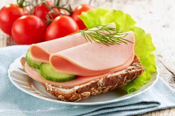 Sandwich with sausage slices — Stock Photo, Image