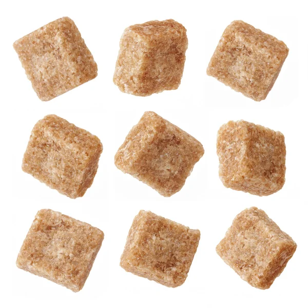 Vários cubos de açúcar mascavo — Fotografia de Stock