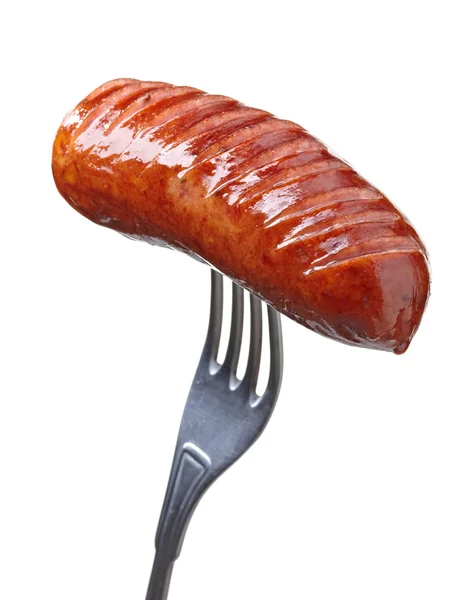 Grilled smoked sausage on a fork — Stock Photo, Image