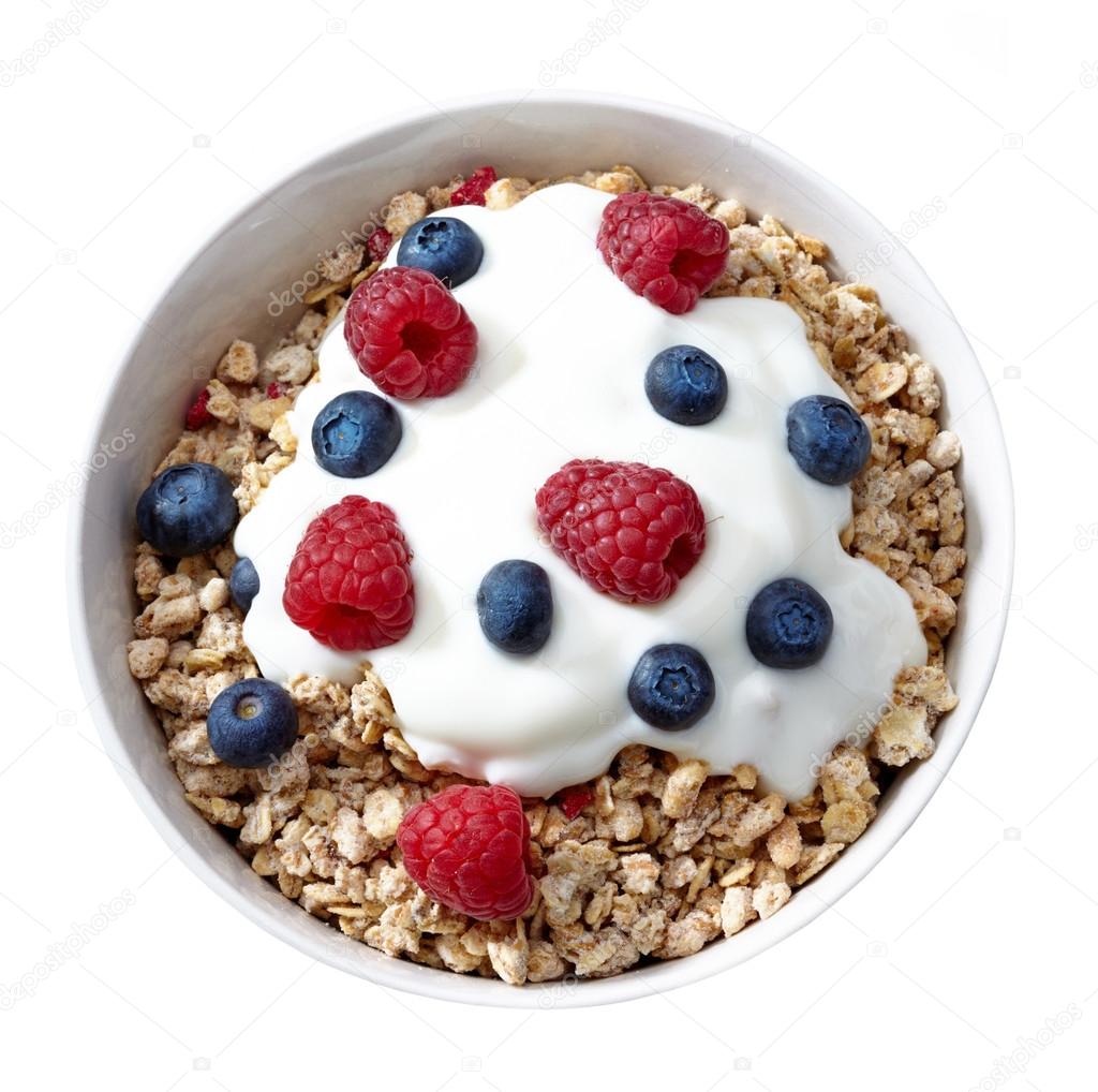 bowl of muesli and yogurt with fresh berries