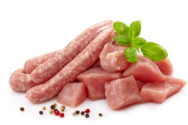 Färsk rå korv och kött — Stockfoto