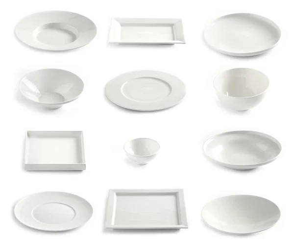 Various empty white plates — Stock Photo, Image