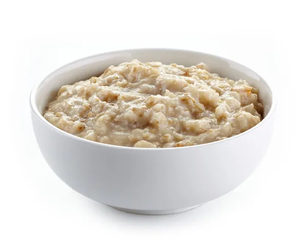 Bowl of oats porridge — Stock Photo, Image